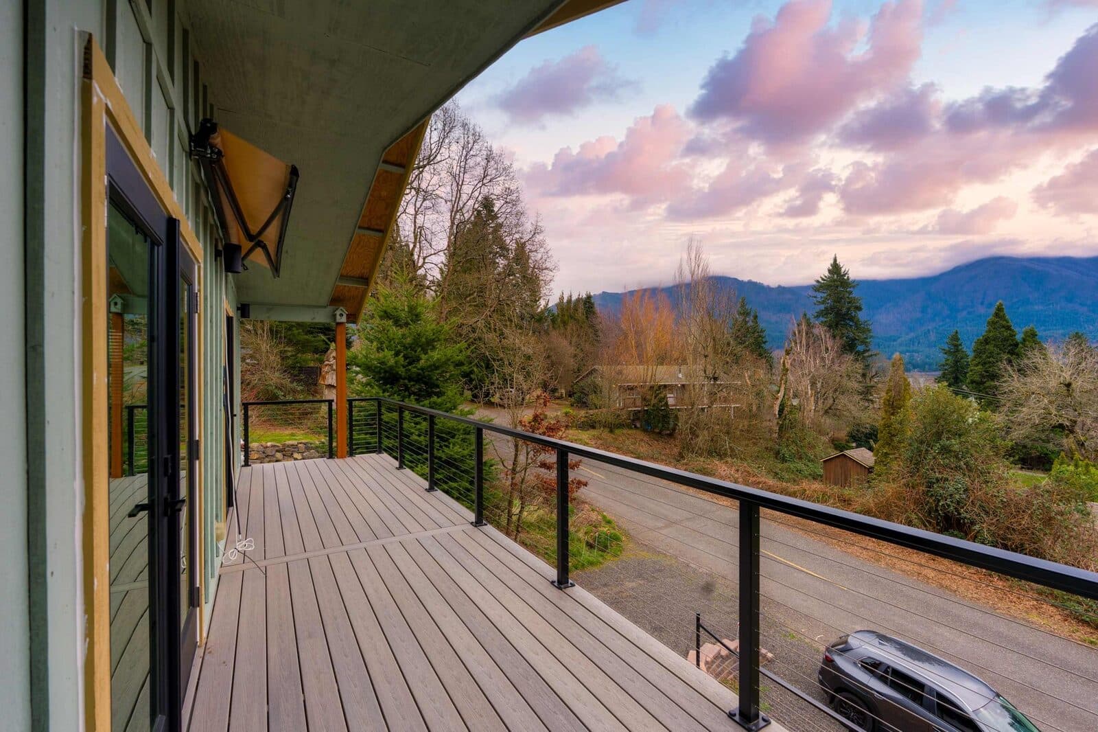 Listing photo: a covered deck looking out over the Gorge in Stevenson